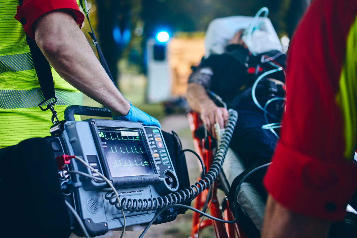 Rescue workers in action, bringing aid to victims in a disaster zone, with rescue equipment.